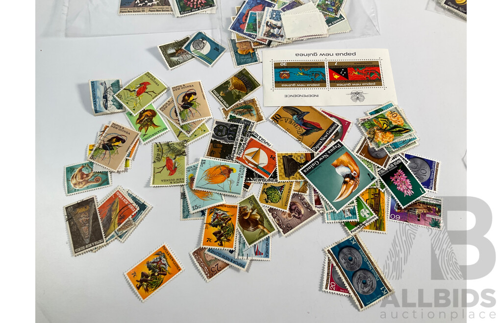 Collection of Papua New Guinea Stamps, Examples Spanning 1961 to 1982 Including Mints and Sets