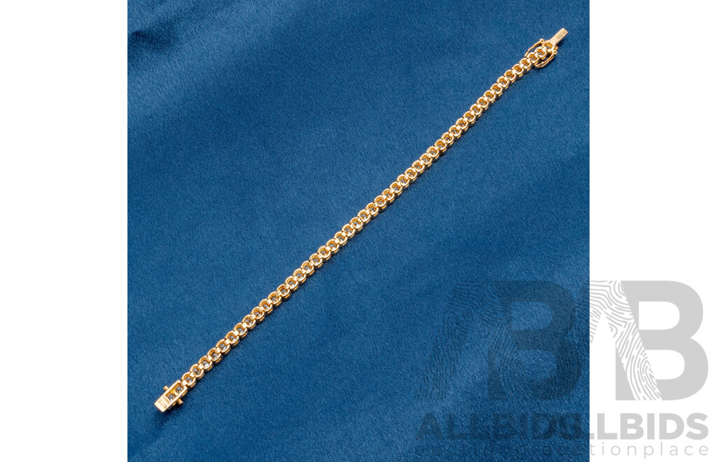 925 Sterling Silver Gold Plated Tennis Bracelet With Cubic Zirconias. Length - 19.5cms