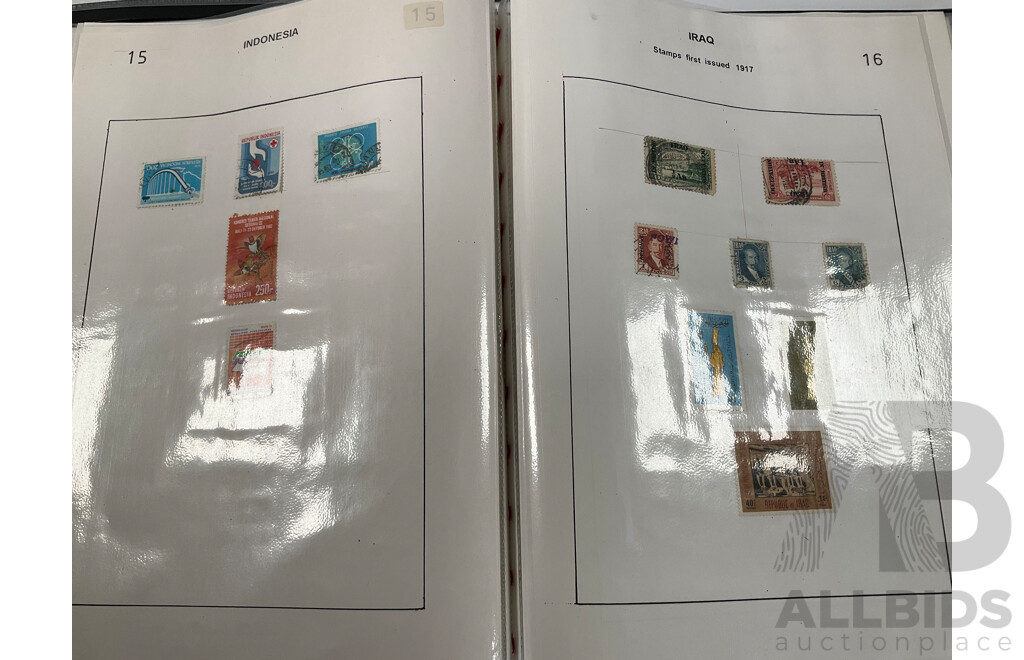 Two Albums of Vintage Stamps Including Transvaal, Togo, Tunesia, Turkey, India, Indonesia, Italy, Japan, Jamaica, Ivory Coast, Irish Fee State, Luxembourg, Liberia, Kedah, Kenya
