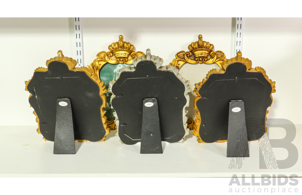 Four Gold Coloured Picture Frames and One Silver