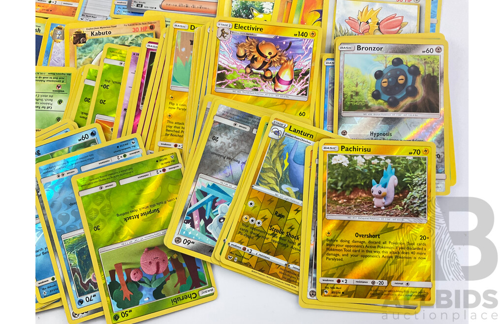 Collection of Pokemon Cards Including Holographic, Basic, Stage One, Trainer