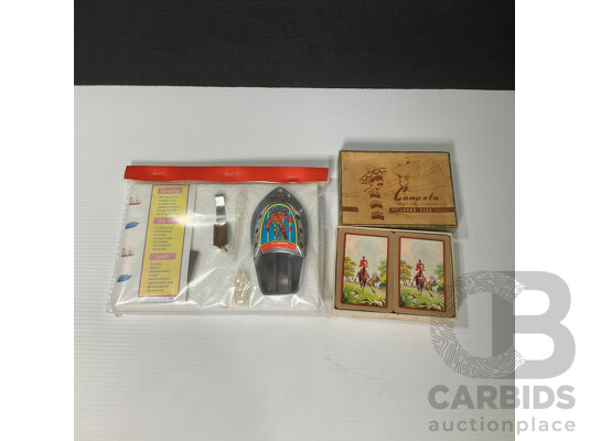Vintage Tin Toy Clickers Including Two West German Examples, Marmite, Hutton's Pineapple Brand, Hudson Industries Canasta Playing Cards, Putt Putt Boat in Sealed Pack, Bradman Playing Cards, Wildflowers of Australia Cards