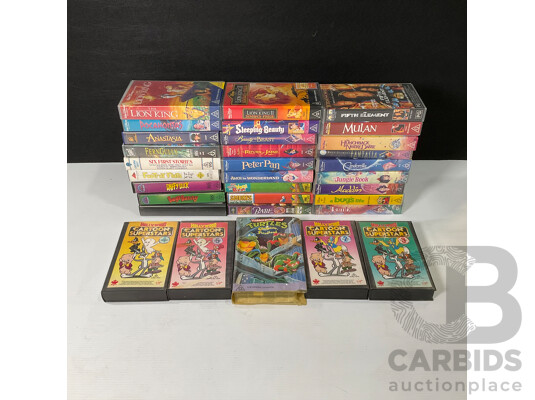 Box of Vintage VHS Cassette Tapes Including Looney Tunes, Disney, Smurfs, Ninja Turtles and More