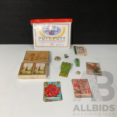Vintage Tin Toy Clickers Including Two West German Examples, Marmite, Hutton's Pineapple Brand, Hudson Industries Canasta Playing Cards, Putt Putt Boat in Sealed Pack, Bradman Playing Cards, Wildflowers of Australia Cards