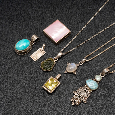Collection of Sterling Silver Pendants and Necklaces, Including Gemstones, 36.45 Grams