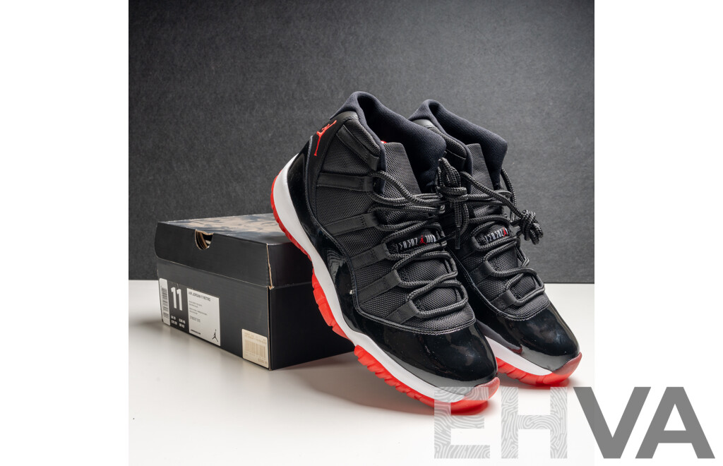 Pair of Nike Air Jordan 11 Retro Bred, 2012