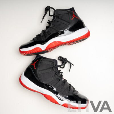 Pair of Nike Air Jordan 11 Retro Bred, 2012