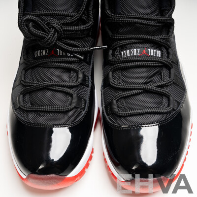 Pair of Nike Air Jordan 11 Retro Bred, 2012