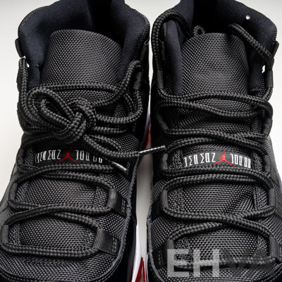 Pair of Nike Air Jordan 11 Retro Bred, 2012