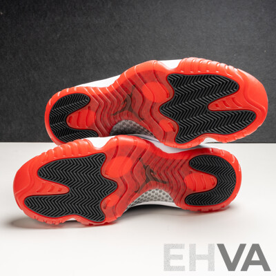 Pair of Nike Air Jordan 11 Retro Bred, 2012