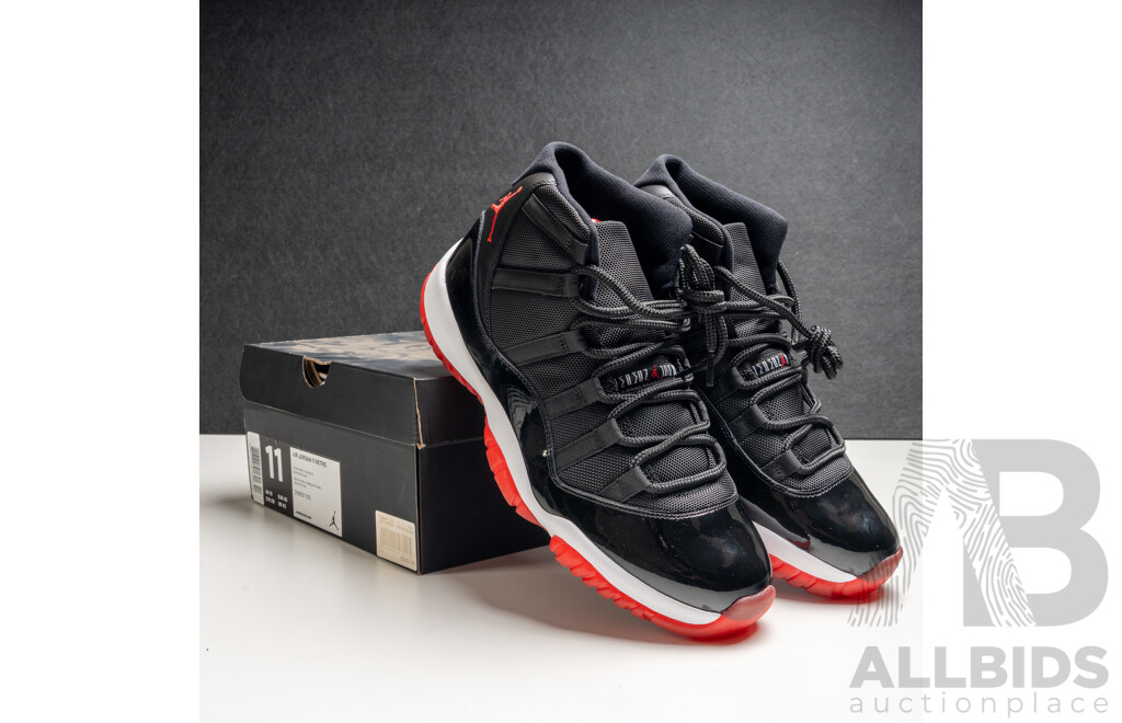 Pair of Nike Air Jordan 11 Retro Bred, 2012