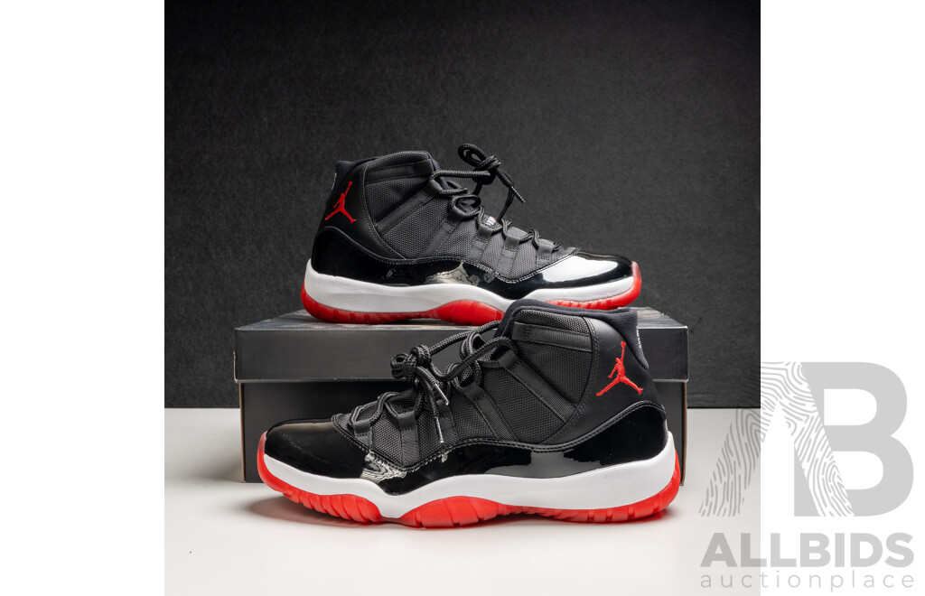 Pair of Nike Air Jordan 11 Retro Bred, 2012