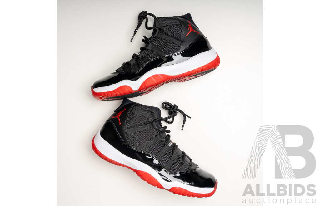 Pair of Nike Air Jordan 11 Retro Bred, 2012
