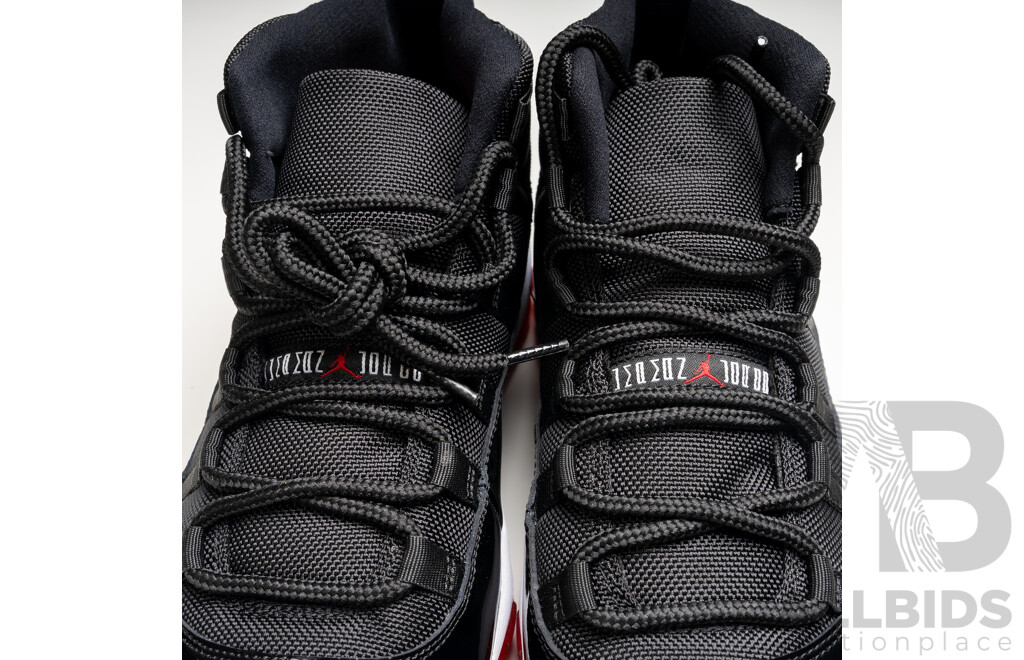 Pair of Nike Air Jordan 11 Retro Bred, 2012