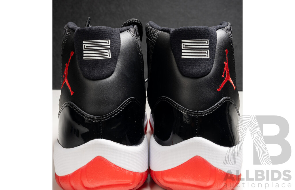 Pair of Nike Air Jordan 11 Retro Bred, 2012