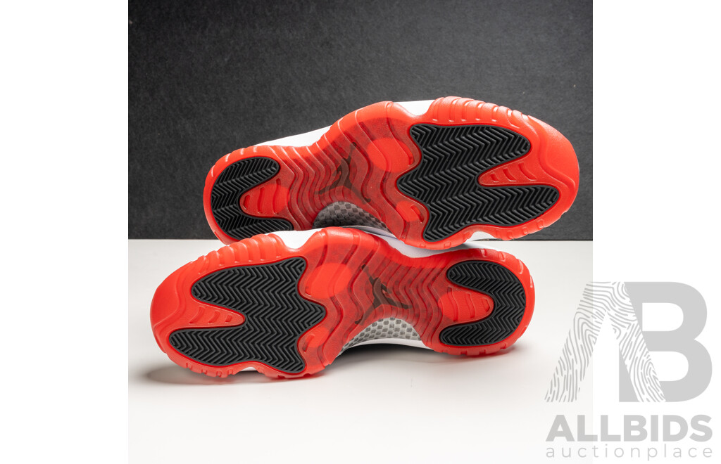 Pair of Nike Air Jordan 11 Retro Bred, 2012