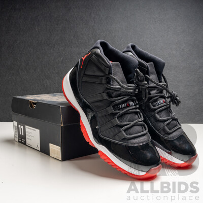 Pair of Nike Air Jordan 11 Retro Bred, 2012