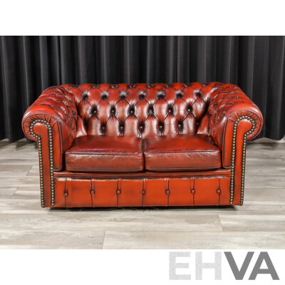 Pair of Moran Ox Blood Leather Chesterfield Two-Seater Lounges