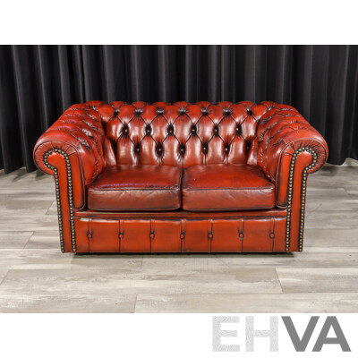 Pair of Moran Ox Blood Leather Chesterfield Two-Seater Lounges