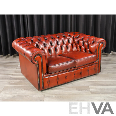 Pair of Moran Ox Blood Leather Chesterfield Two-Seater Lounges