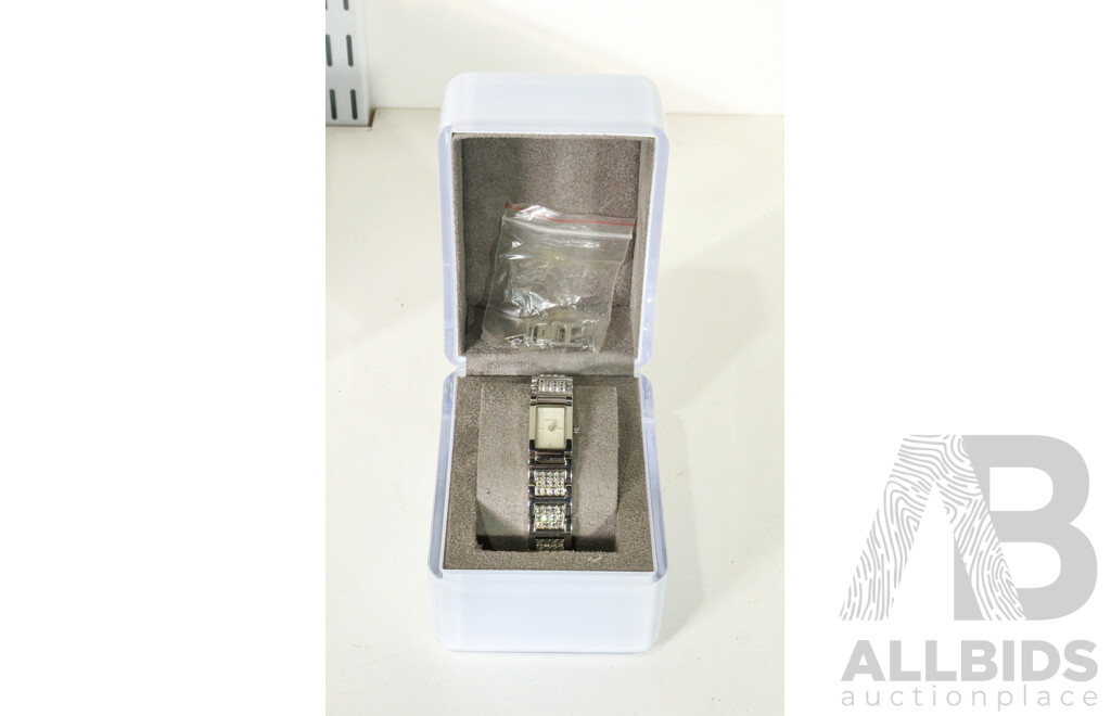 Vintage Cigarette Lighters Including Ronson Battery Powered, Imco Triplex Kerosene, Zippo Scrimshaw, DKNY Women's Watch with Box, Vintage Matchbox Collection Including Qantas and Life Be in It, Rollei Projector