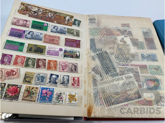 Two Albums of Vintage International Stamps Including Australian Predecimal, Canada, Great Britain, Philippines, Fiji, USA, Poland, Germany, New Zealand, Papua New Guinea and More