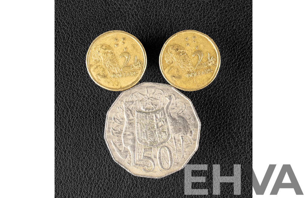 Two Australian 1999 Two Dollar Coins with Rim Errors and 1981 Fifty Cent Coin with Lamination Peel