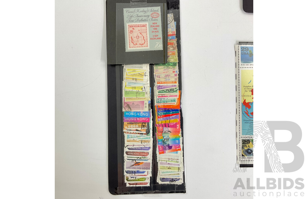 USA Mint Stamp Sheet, Legends of Hollywood, Humphry Bogart, 1942: Into the Battle Mint Stamp Strips, Two Coca Cola Bottlers Selection of Pictorial Stamps of the World, Collection of Hong Kong Stamps, Cocos Island 25 Anniversary 1st Definitive Issue