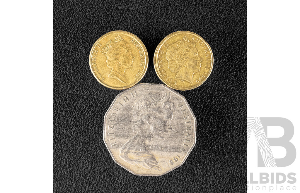 Two Australian 1999 Two Dollar Coins with Rim Errors and 1981 Fifty Cent Coin with Lamination Peel