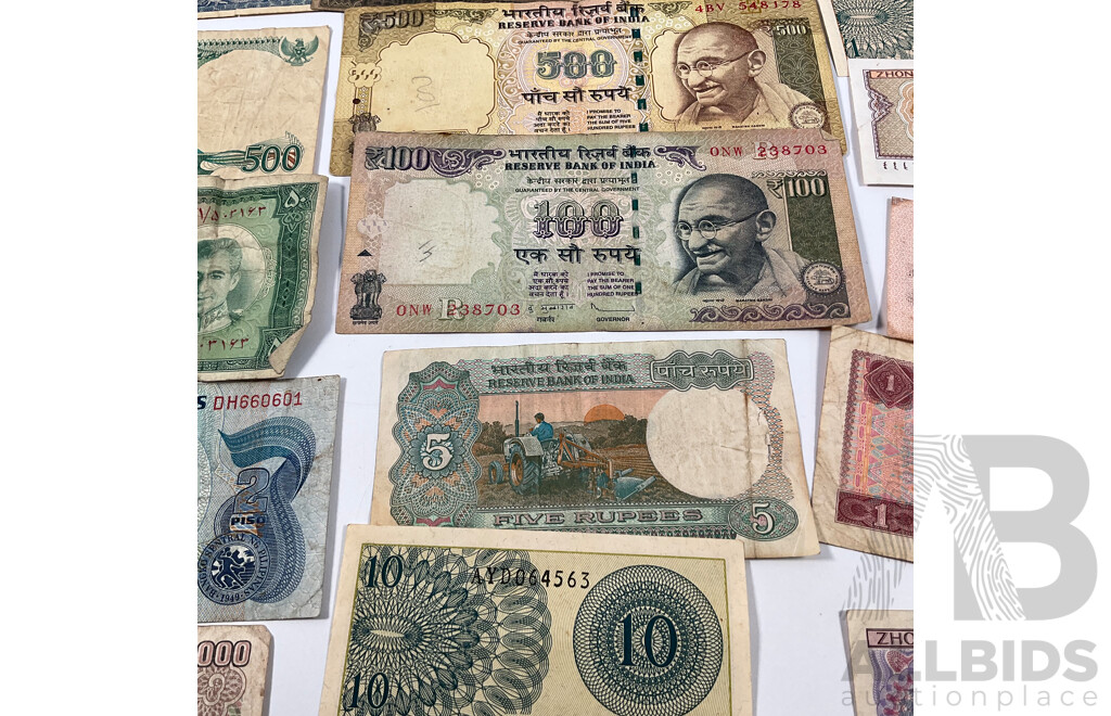 Collection of Vintage International Banknotes Including Philippines, India, Indonesia, China, Vietnam