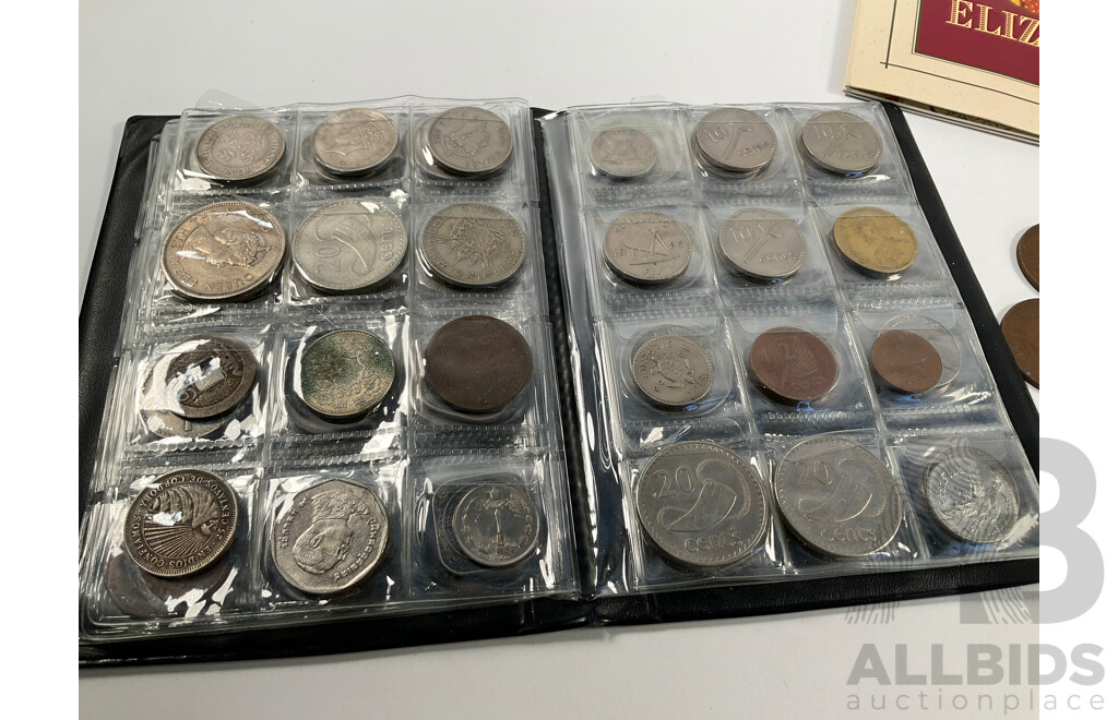 Two Albums of Vintage International Coins Including United Kingdom and Australian Pennies and Half Pennies, China, New Zealand, India, Westair Replica Coins, Mint USA Stamp Strips and Blocks