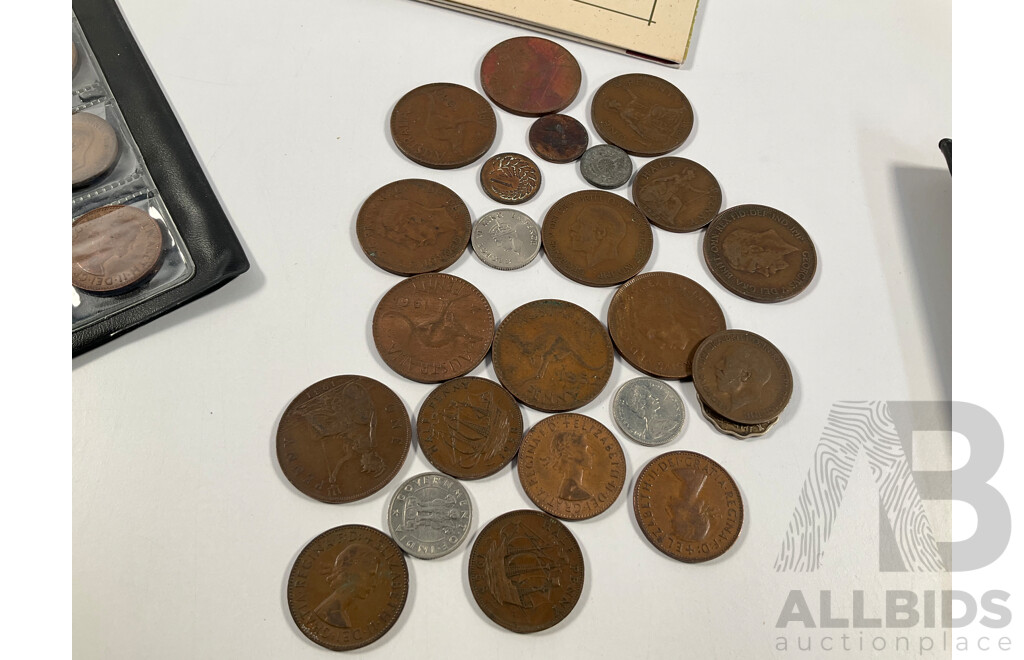 Two Albums of Vintage International Coins Including United Kingdom and Australian Pennies and Half Pennies, China, New Zealand, India, Westair Replica Coins, Mint USA Stamp Strips and Blocks