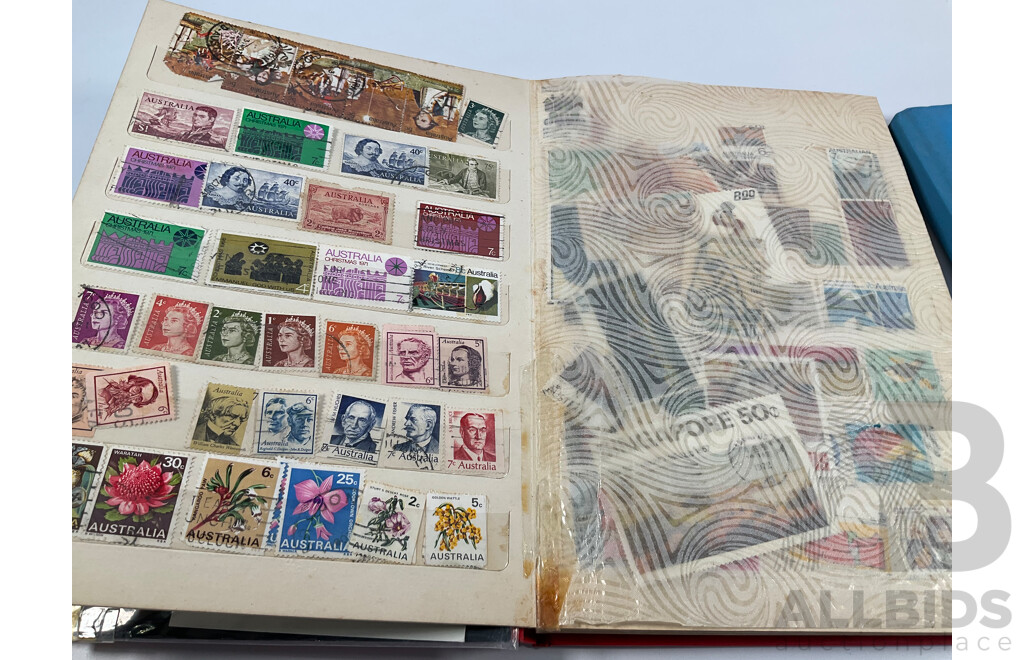 Two Albums of Vintage International Stamps Including Australian Predecimal, Canada, Great Britain, Philippines, Fiji, USA, Poland, Germany, New Zealand, Papua New Guinea and More