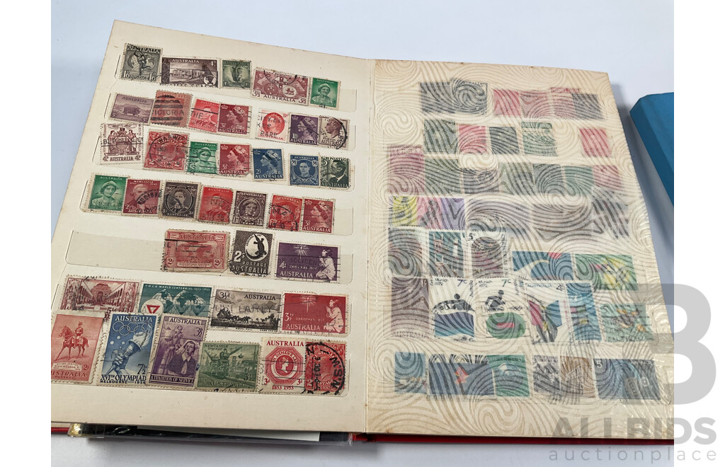 Two Albums of Vintage International Stamps Including Australian Predecimal, Canada, Great Britain, Philippines, Fiji, USA, Poland, Germany, New Zealand, Papua New Guinea and More