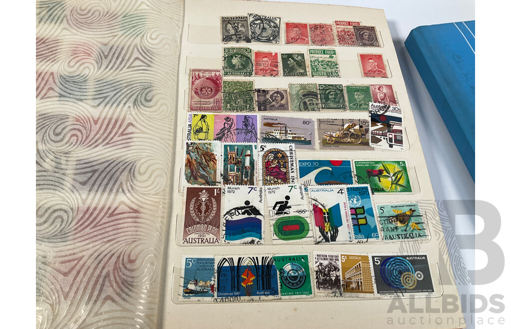 Two Albums of Vintage International Stamps Including Australian Predecimal, Canada, Great Britain, Philippines, Fiji, USA, Poland, Germany, New Zealand, Papua New Guinea and More