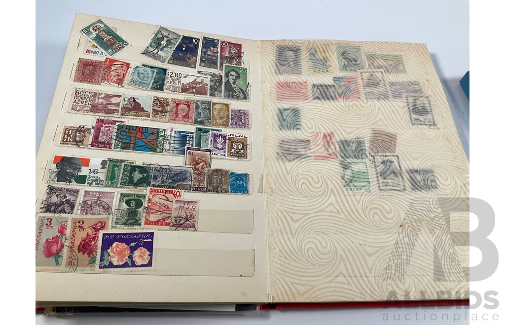 Two Albums of Vintage International Stamps Including Australian Predecimal, Canada, Great Britain, Philippines, Fiji, USA, Poland, Germany, New Zealand, Papua New Guinea and More