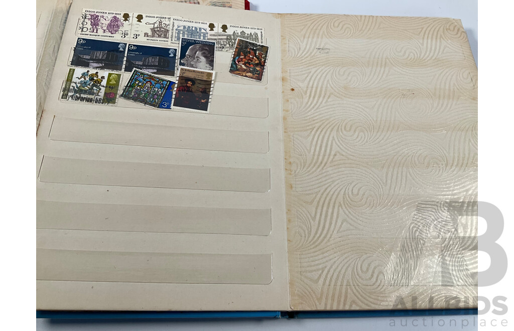 Two Albums of Vintage International Stamps Including Australian Predecimal, Canada, Great Britain, Philippines, Fiji, USA, Poland, Germany, New Zealand, Papua New Guinea and More