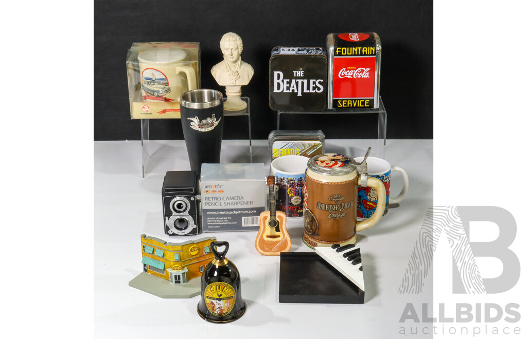 Collection of Music and TV Paraphernalia Including Mugs, Beatles Coasters, Vintage Coca Cola Napkin Holder, Retro Pencil Sharpener and More