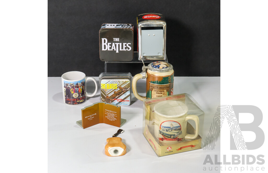 Collection of Music and TV Paraphernalia Including Mugs, Beatles Coasters, Vintage Coca Cola Napkin Holder, Retro Pencil Sharpener and More