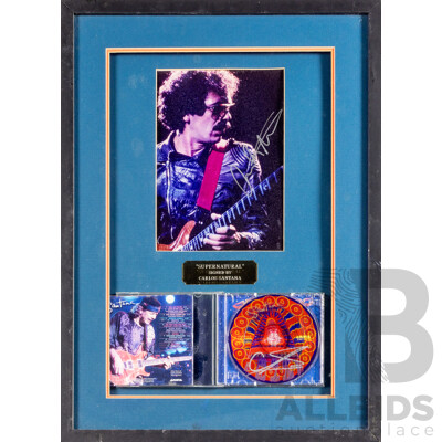 Framed Carlos Santana Photograph and Supernatural CD, Both Signed by Santana, 58 x 43 cm (frame)