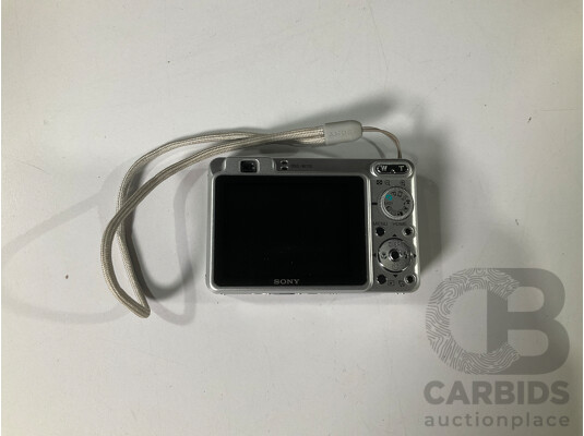 Sony Cyber-shot Camera and Battery Charger in Case