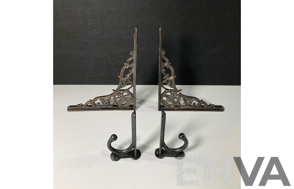Two Pairs of Cast Iron Wall Mounts