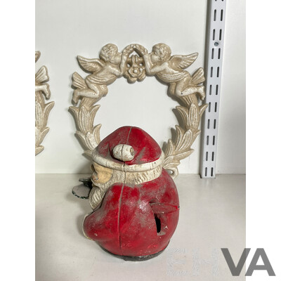Collection of Mixed Cast Iron Including Two Angel Wall Mount, Smilin Sam and Santa Coin Bank