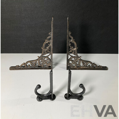 Two Pairs of Cast Iron Wall Mounts