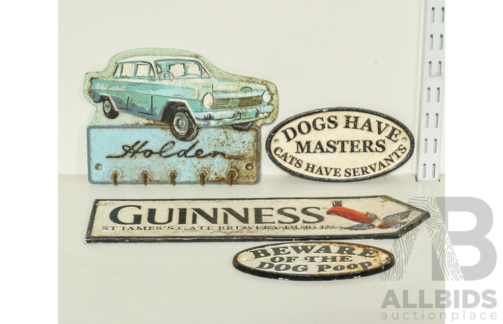Collection of Cast Iron Wall Mounts Including Guinness, Holden Key Hanger, and More