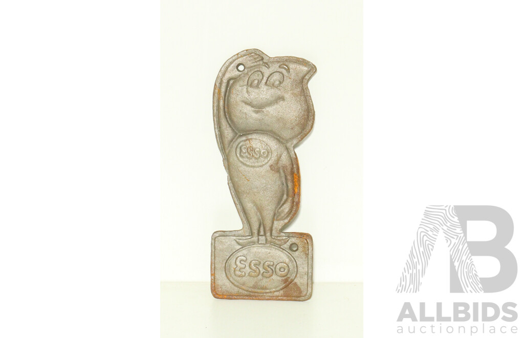 Collection of Cast Iron Wall Mounts Including Two Esso and Two Michelin Tires