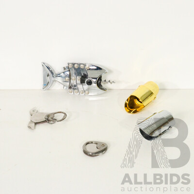 Pair of Georg Jensen Champagne Stoppers, Lazy Fish Corkscrew, and Pair of Unique Pocket Knives