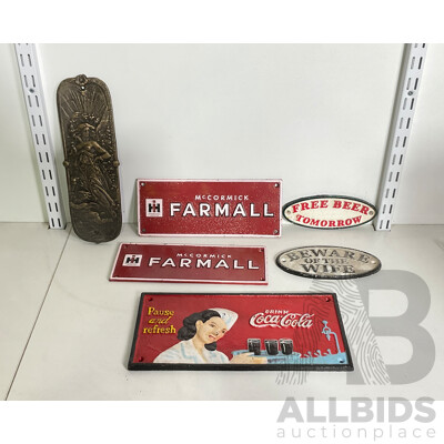 Collection of Mixed Cast Iron Wall Mounts Including Coca Cola, Farmall, Free Beer and More