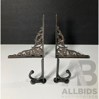 Two Pairs of Cast Iron Wall Mounts