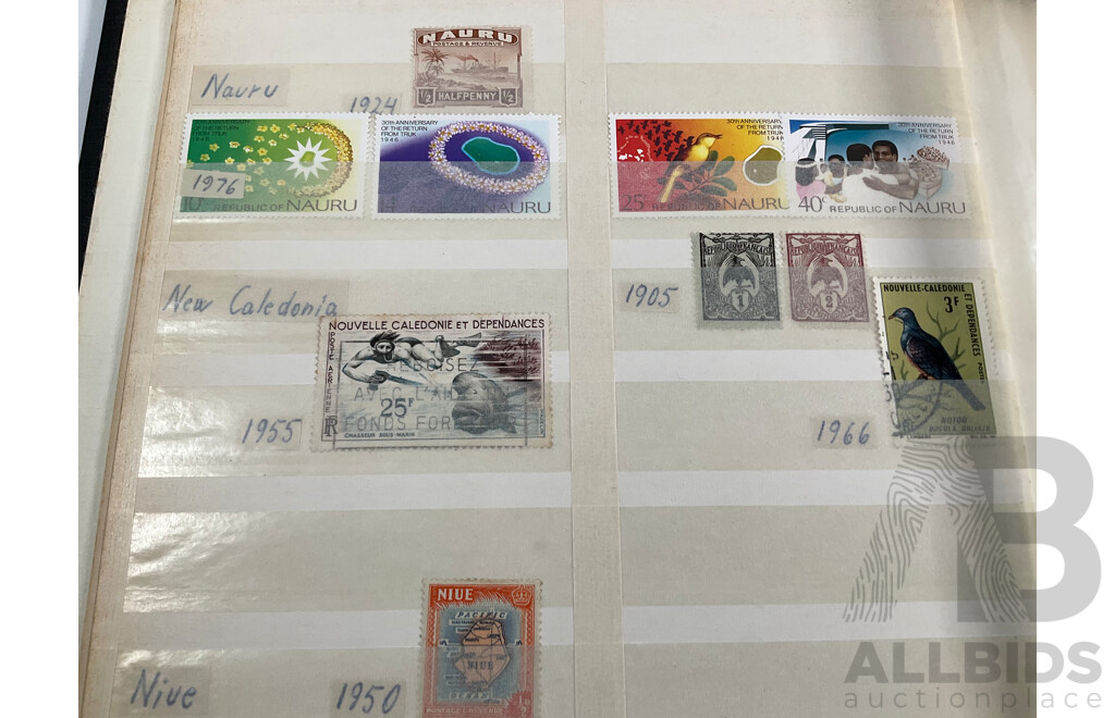 Two Albums of Antique and Vintage Stamps Including Nauru, PNG, Africa, South America, China, Central America, Japan, Middle East, Singapore, Greece, Hungary, Italy, Ireland, Norway